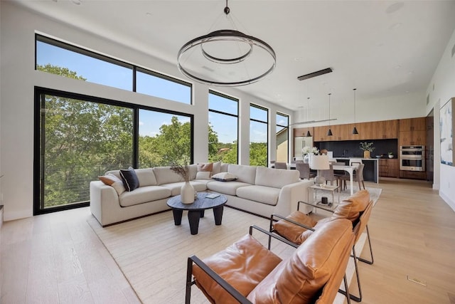 4502 Hyridge Dr, Austin, TX 78759 - living room featuring light wood finished floors