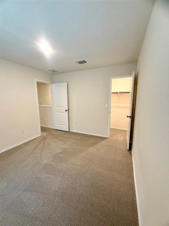 empty room featuring carpet