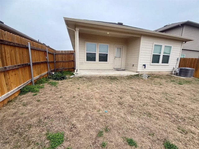 back of house featuring central AC and a patio