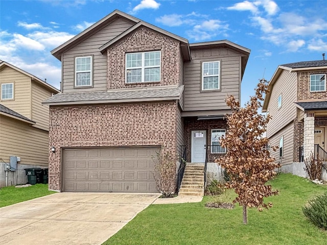 view of front of property with a garage and a front lawn