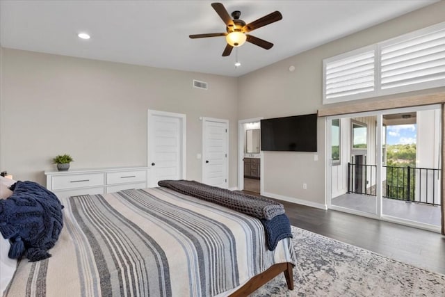 bedroom with connected bathroom, dark hardwood / wood-style floors, access to outside, and ceiling fan