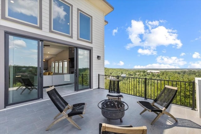 view of patio / terrace featuring a fire pit