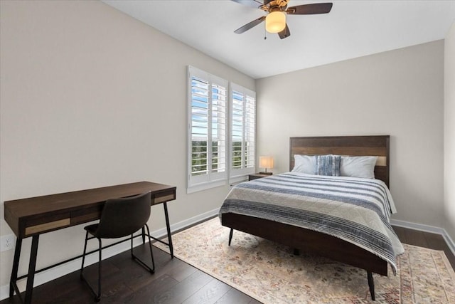 bedroom featuring dark wood-type flooring and ceiling fan