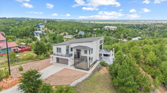 117 Nakalele Ln, Bastrop, TX 78602 - view of subject property with a heavily wooded area