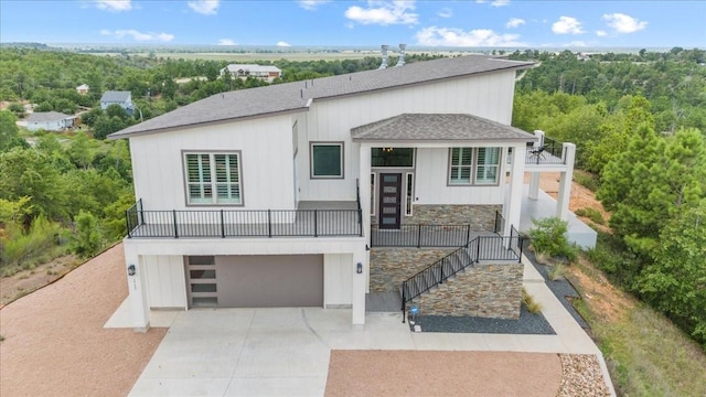 view of front of property with a garage