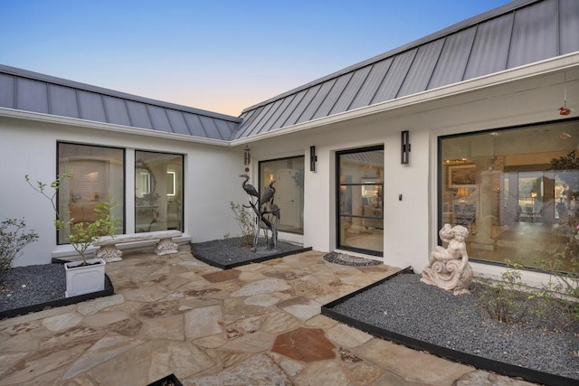 1027 Challenger, Lakeway, TX 78734 - patio terrace at dusk with a patio