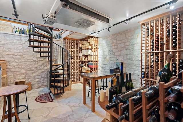 wine room with rail lighting