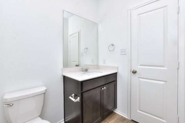 605 Rancho Del Cielo Loop, Jarrell, TX 76537 - half bath with vanity, toilet, and wood finished floors