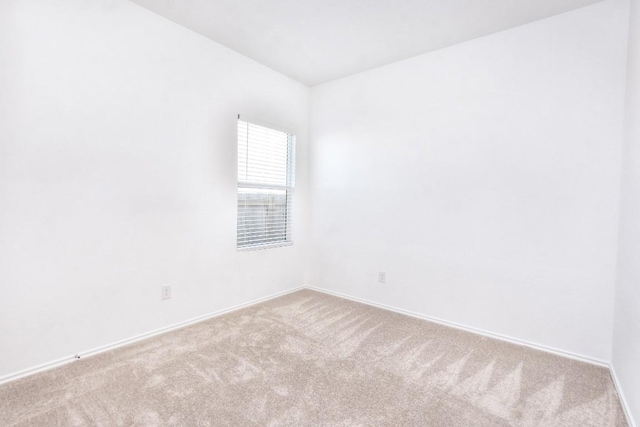605 Rancho Del Cielo Loop, Jarrell, TX 76537 - spare room with carpet floors and baseboards
