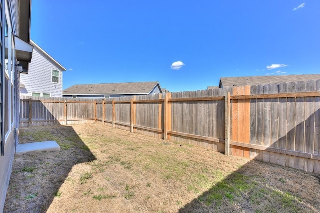 view of yard featuring a fenced backyard