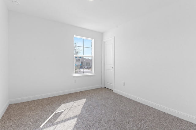 empty room featuring carpet