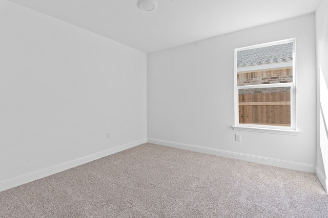 empty room with carpet floors