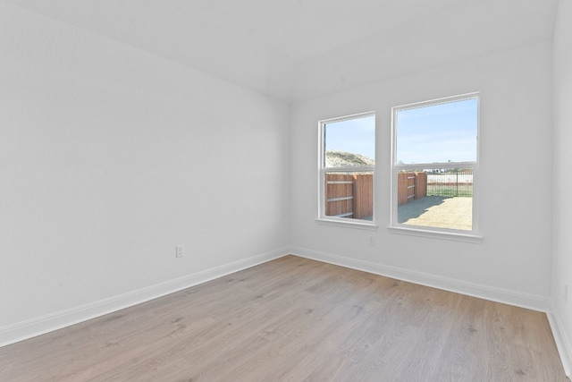 empty room with light wood-type flooring