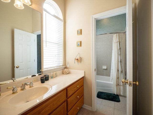 bathroom featuring shower / tub combo, vanity, and tile patterned flooring