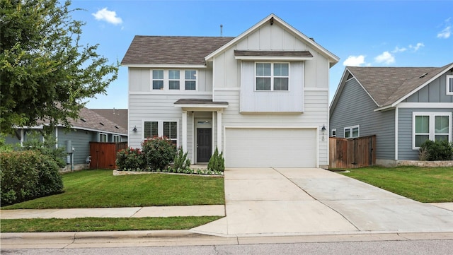 view of front of home with a garage and a front yard