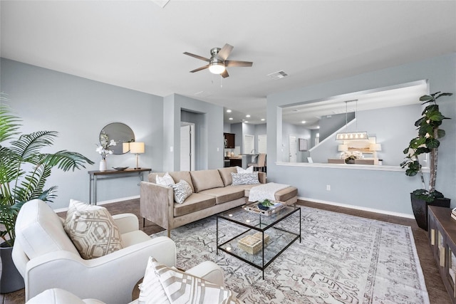 living room with ceiling fan