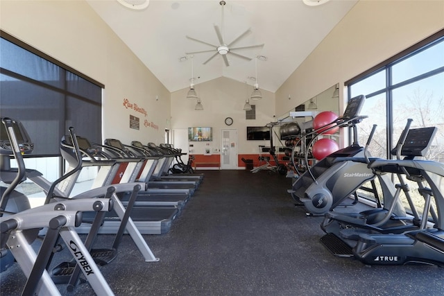 workout area with high vaulted ceiling and ceiling fan
