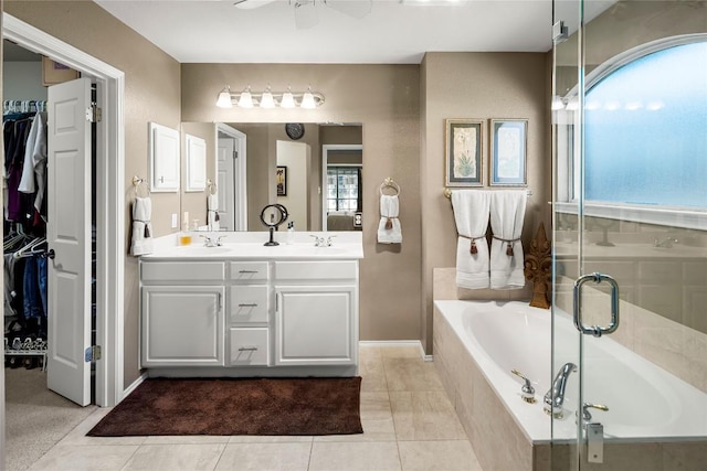 bathroom featuring ceiling fan, vanity, shower with separate bathtub, and tile patterned flooring