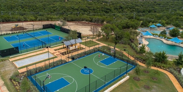 view of basketball court featuring tennis court