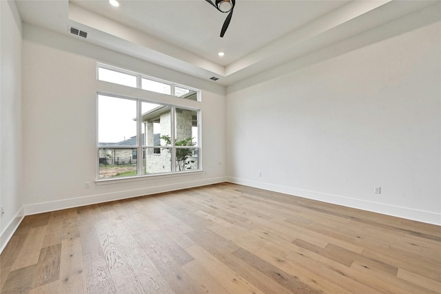 unfurnished room featuring light hardwood / wood-style floors