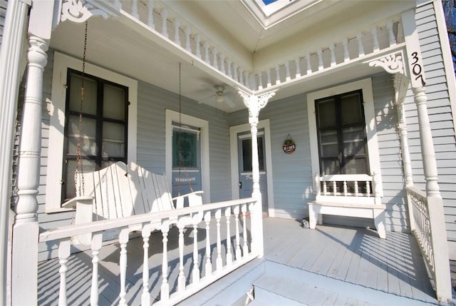 wooden terrace featuring a porch