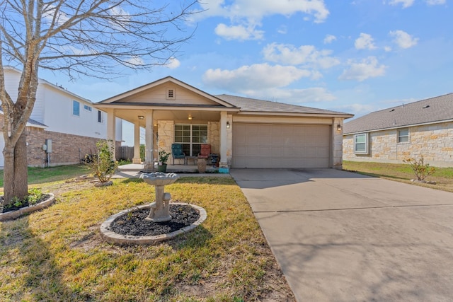 ranch-style house featuring a garage, a front lawn, and a porch