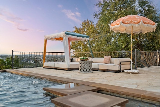 4908 Mirador Dr, Austin, TX 78735 - deck at dusk with an outdoor hangout area and a patio area