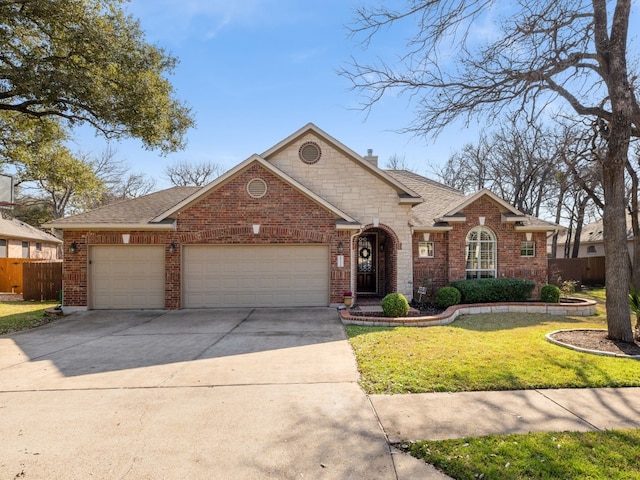 view of front of house with a garage and a front yard