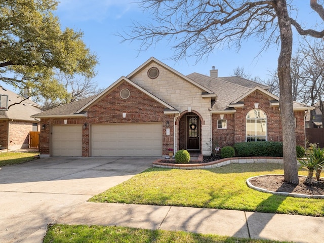 view of front of home with a garage and a front yard