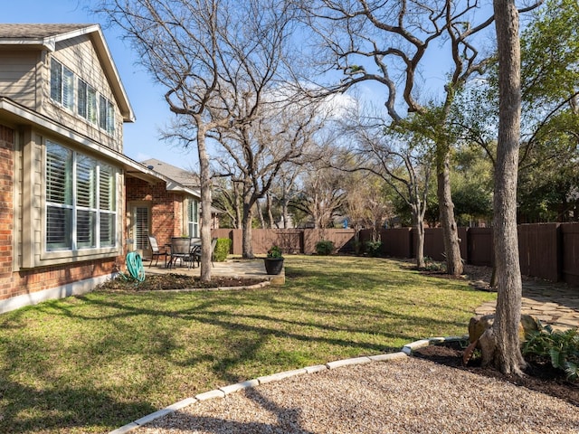 view of yard with a patio area