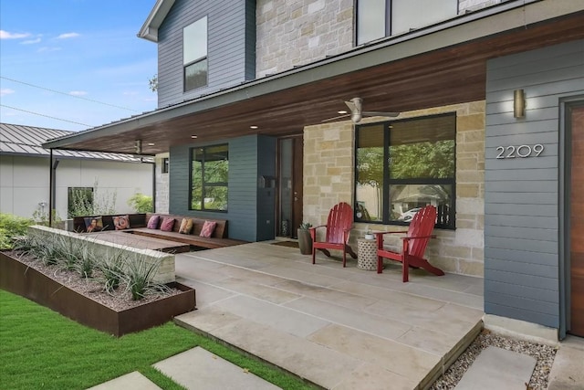 view of patio / terrace featuring covered porch and ceiling fan