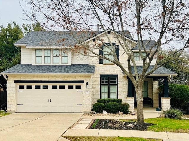 view of front of property with a garage