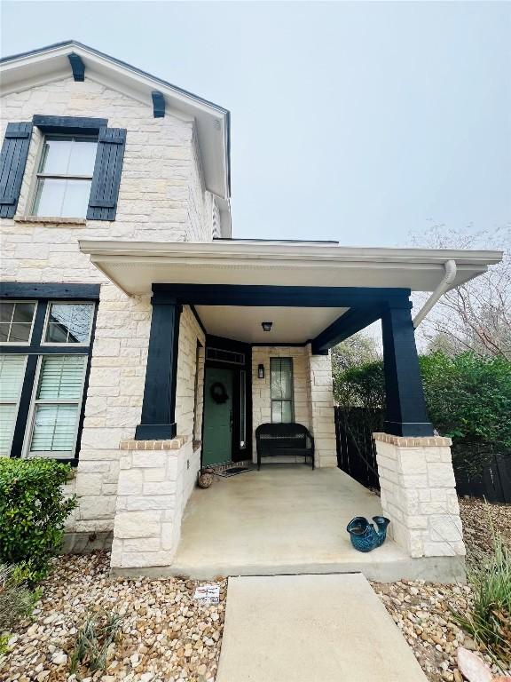 doorway to property featuring a porch