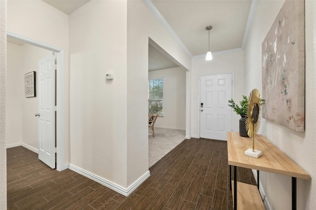 21005 Isle Of Glass St, Pflugerville, TX 78660 - foyer entrance featuring dark wood-style floors, crown molding, and baseboards
