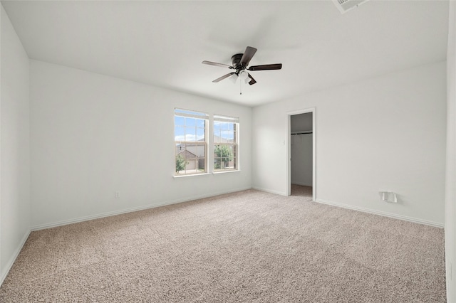 21005 Isle Of Glass St, Pflugerville, TX 78660 - unfurnished bedroom with light carpet, baseboards, and ceiling fan