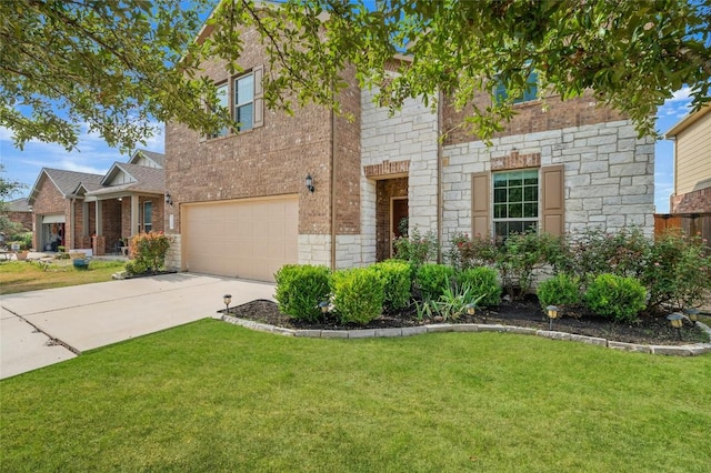 21005 Isle Of Glass St, Pflugerville, TX 78660 - view of front of property with a garage, concrete driveway, a front yard, brick siding, and stone siding