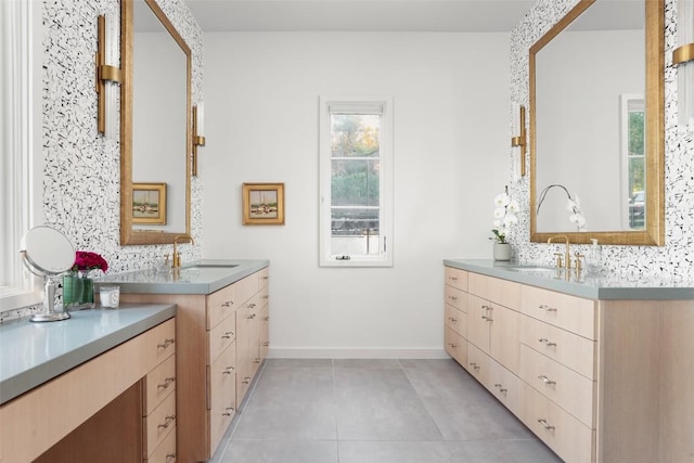 bathroom featuring tile patterned flooring and vanity