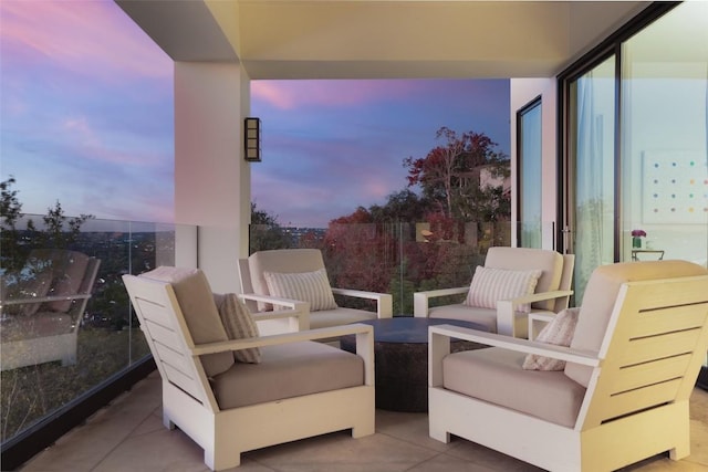 patio terrace at dusk with a balcony