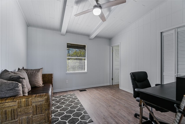 office space featuring wood-type flooring, lofted ceiling with beams, and ceiling fan