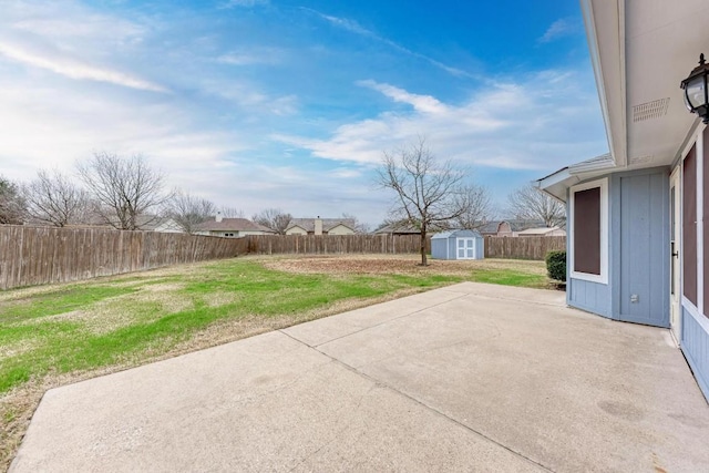 view of patio / terrace with a storage shed