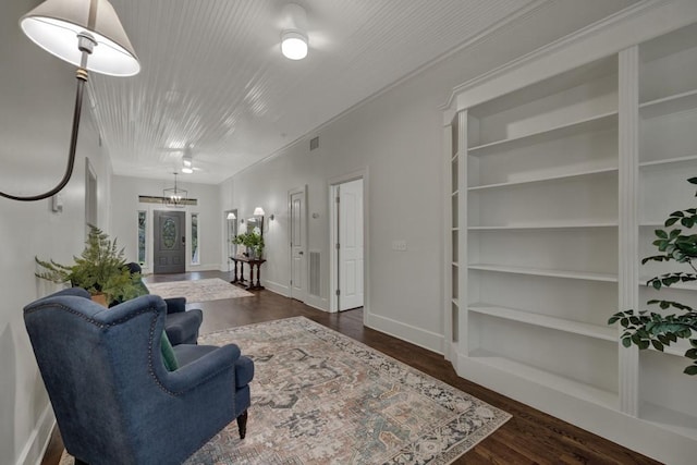 interior space with dark hardwood / wood-style flooring