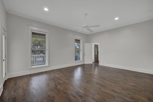 unfurnished room featuring crown molding, dark wood-type flooring, and ceiling fan