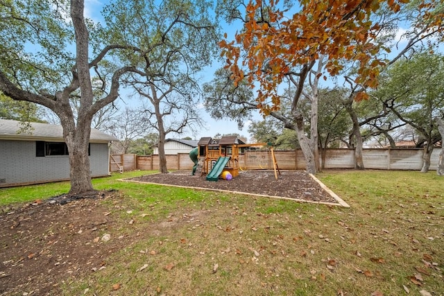 view of playground featuring a yard