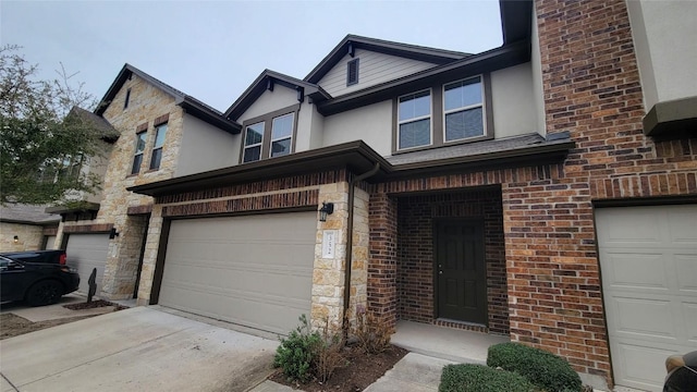 view of front of property featuring a garage