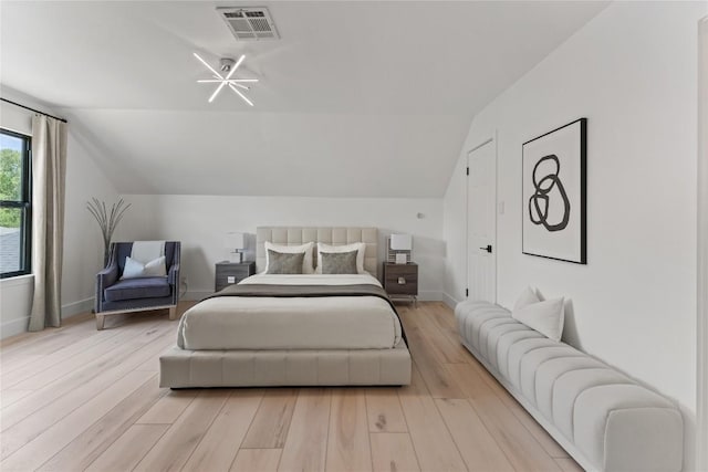 608 Whispering Oaks Dr, Salado, TX 76571 - bedroom with lofted ceiling, wood finished floors, and baseboards
