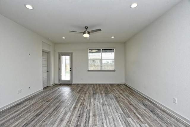 empty room with wood-type flooring and ceiling fan