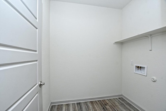 laundry area with gas dryer hookup, dark hardwood / wood-style flooring, and hookup for a washing machine