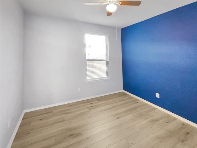 unfurnished room featuring ceiling fan and light hardwood / wood-style floors