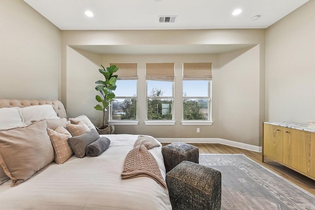 bedroom featuring hardwood / wood-style floors