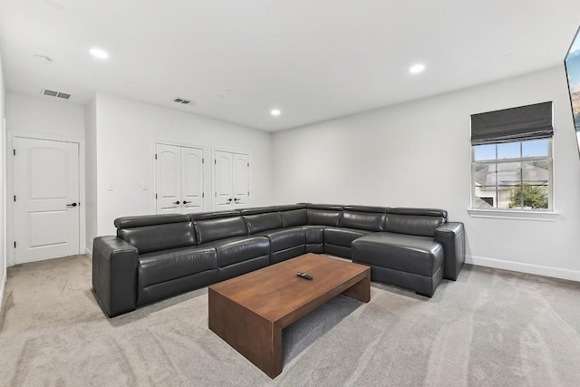 living room with light colored carpet